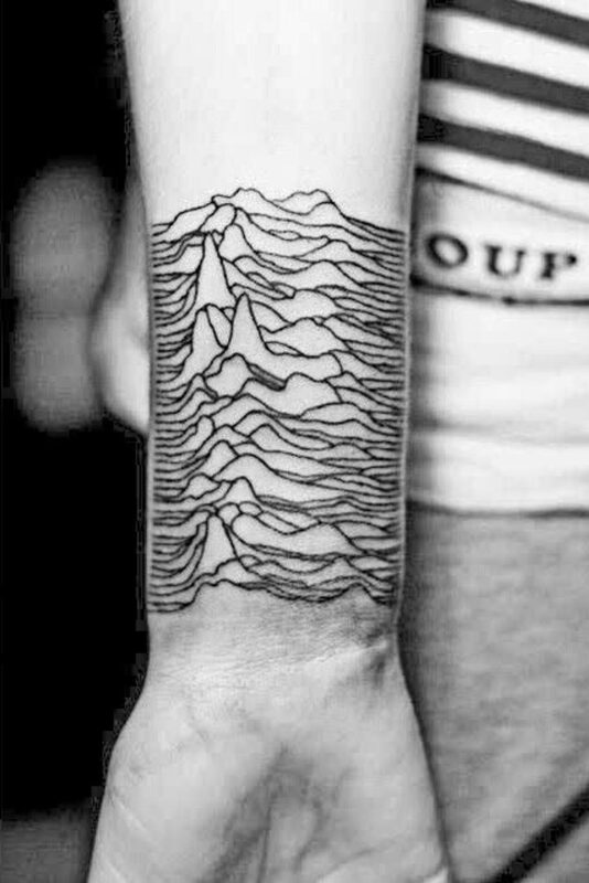 Joy Division pulse tattoo shared by Κωνσταντίνος Παντέλογλου — reference image from Tattoodo