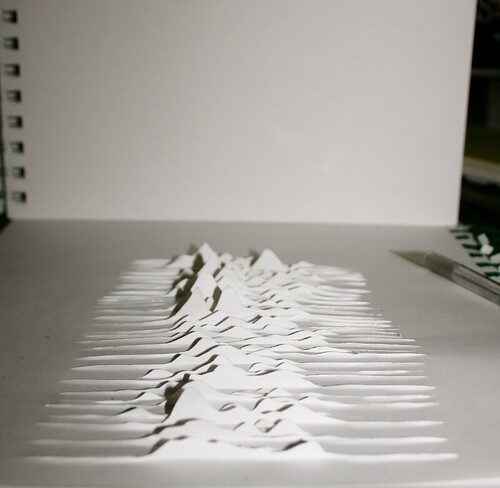 Unknown Pleasures paper-cut sculpture — reference image from Flickr