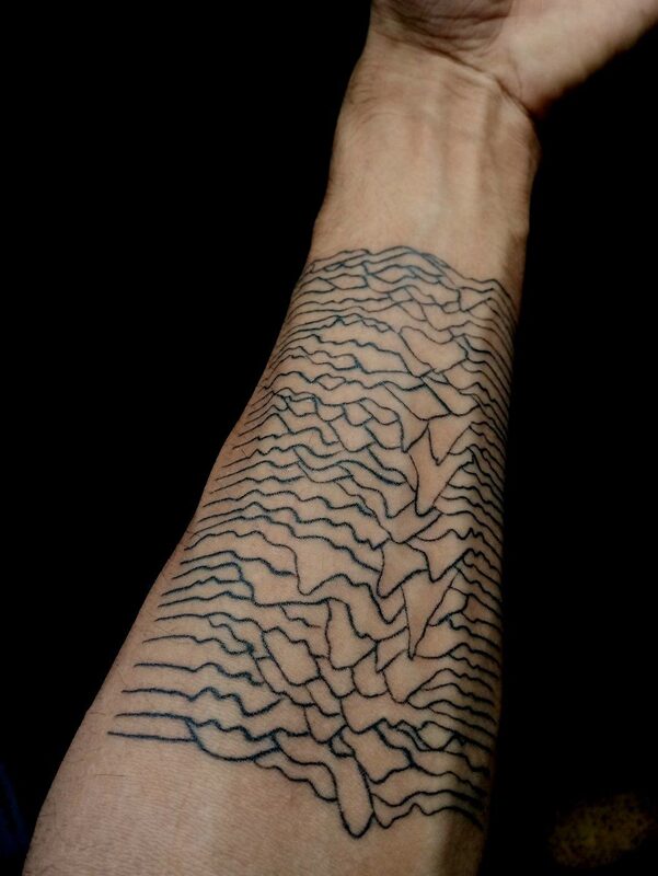 Unknown Pleasures tattoo — Felipe Toledo — reference image from Tattoodo